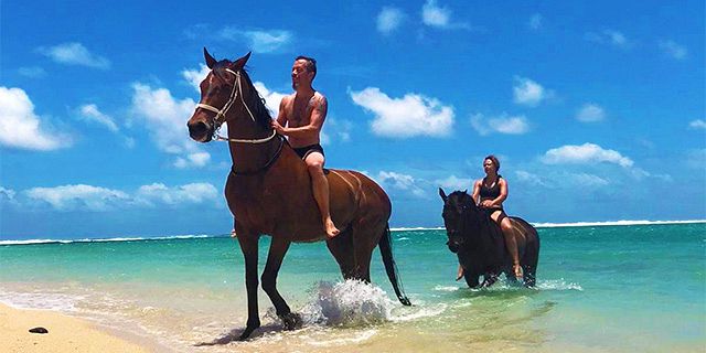 Romantic horseback riding swimming riambel beach (2)